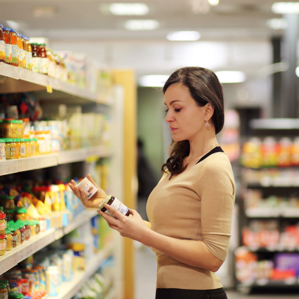 woman reading product info